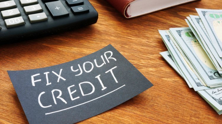note on desk about fixing credit