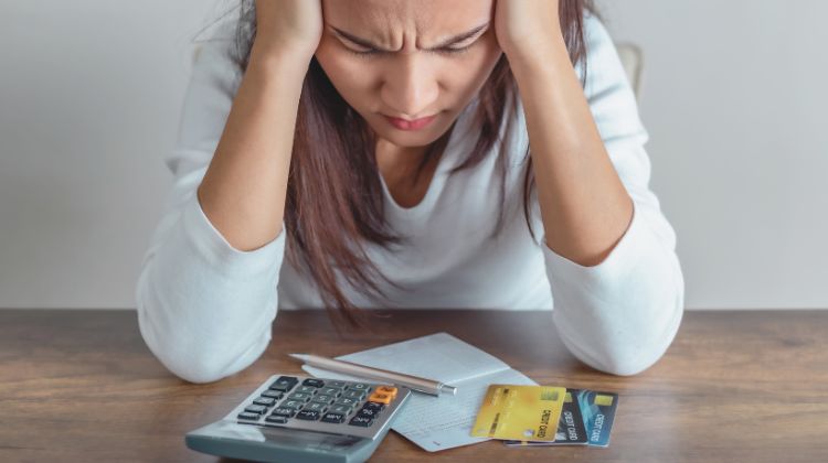 woman stressed about credit card debt